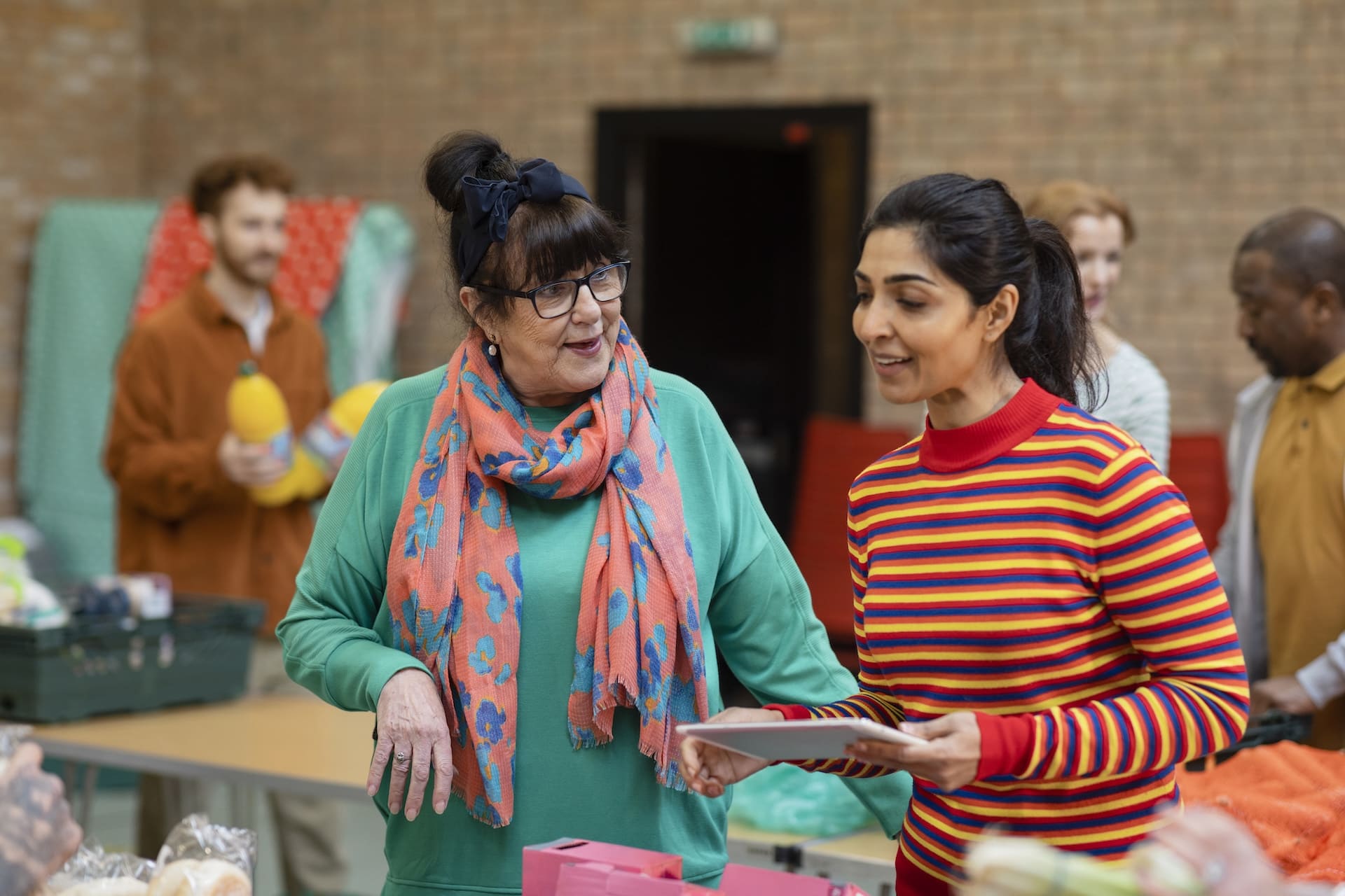 Case Study - MyFriendBen - Volunteers at a community event